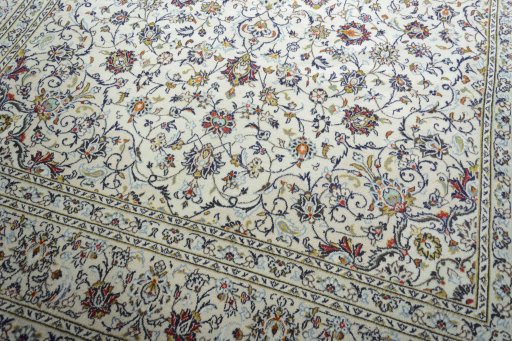 Close-up detail of 2000s Kashan rug from Iran / Persia showing Wool weave