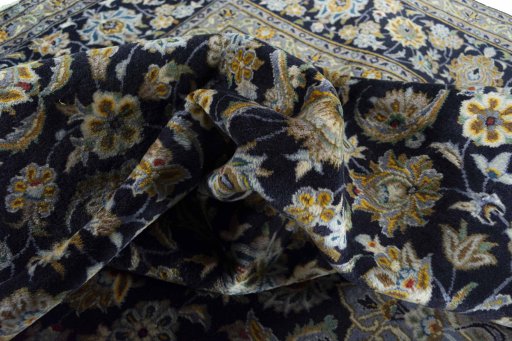 Surface texture of 2000s Kashan rug with natural Wool and intricate pattern