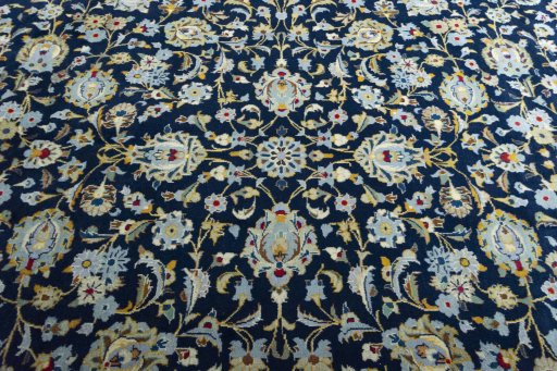 Central medallion detail of 2000s Kashan rug from Iran / Persia