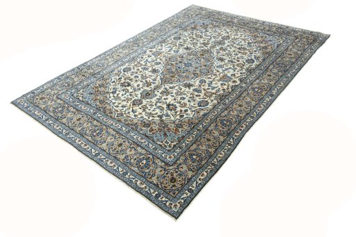 Corner detail of 2000s Kashan rug showing border pattern and Wool pile