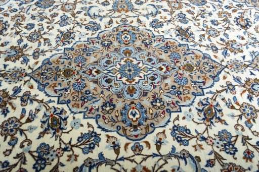 Central medallion detail of 2000s Kashan rug from Iran / Persia