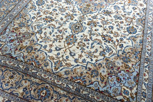 Close-up detail of 2000s Kashan rug from Iran / Persia showing Wool weave