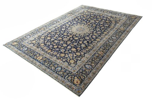 Corner detail of 2000s Kashan rug showing border pattern and Wool pile