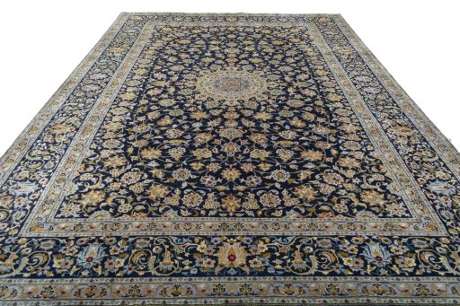 Surface texture of 2000s Kashan rug with natural Wool and intricate pattern