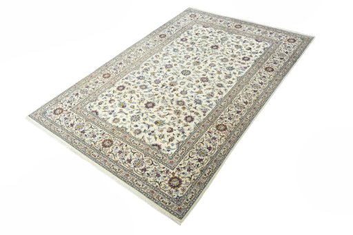 Corner detail of 2000s Kashan rug showing border pattern and Wool pile