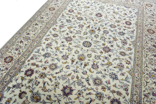 Backside of handmade 2000s Kashan rug showing knot structure and weave density
