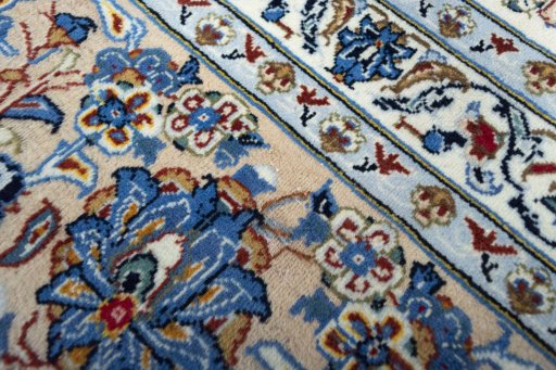 Surface texture of 2000s Kashan rug with natural Wool and intricate pattern