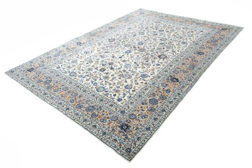 Corner detail of 2000s Kashan rug showing border pattern and Wool pile