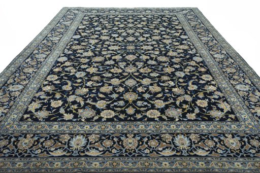 Surface texture of 2000s Kashan rug with natural Wool and intricate pattern