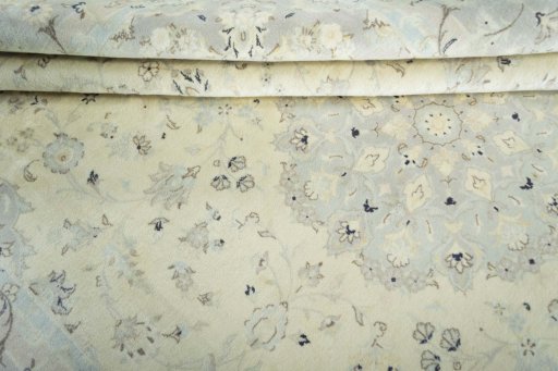 Close-up detail of New Kashan rug from Iran / Persia showing Wool weave