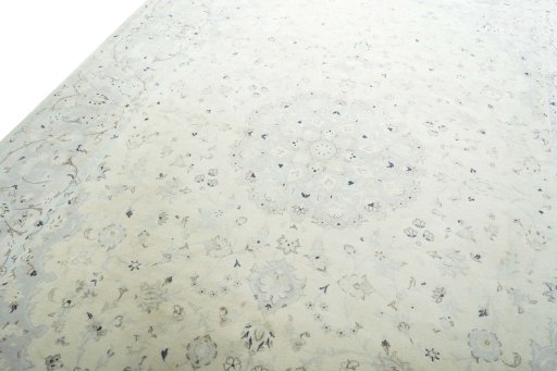 Backside of handmade New Kashan rug showing knot structure and weave density