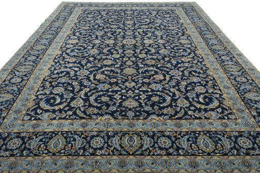 Surface texture of 2000s Kashan rug with natural Wool and intricate pattern