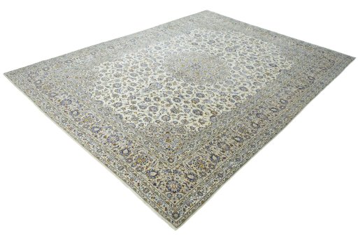 Corner detail of 2000s Kashan rug showing border pattern and Wool pile