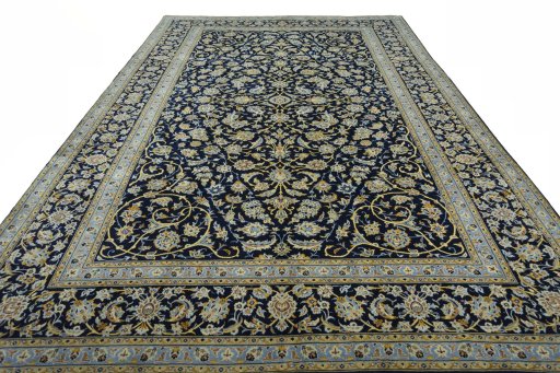 Surface texture of 2000s Kashan rug with natural Wool and intricate pattern