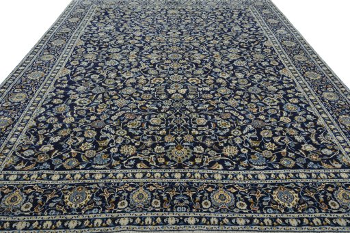 Surface texture of 2000s Kashan rug with natural Wool and intricate pattern