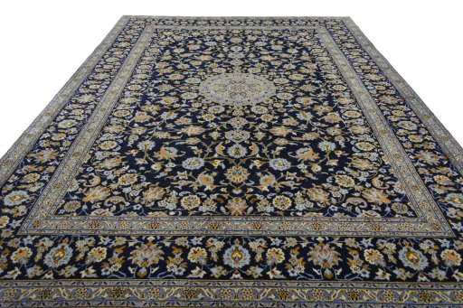 Surface texture of 2000s Kashan rug with natural Wool and intricate pattern