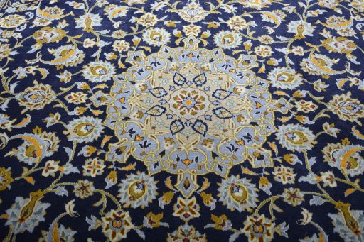 Central medallion detail of 2000s Kashan rug from Iran / Persia
