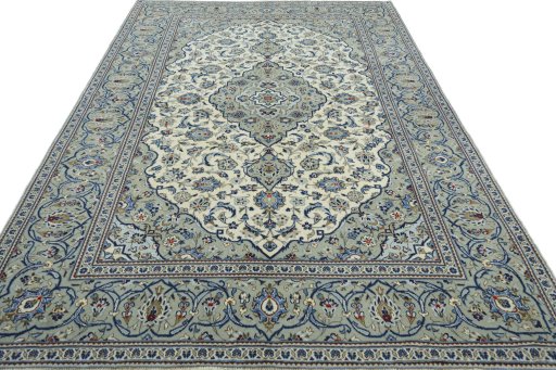 Surface texture of 2000s Kashan rug with natural Wool and intricate pattern