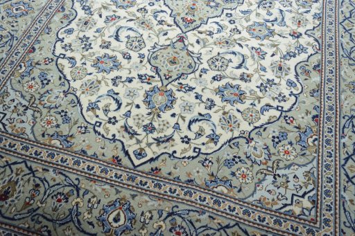 Close-up detail of 2000s Kashan rug from Iran / Persia showing Wool weave