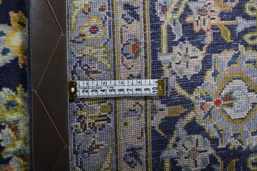Central medallion detail of 2000s Kashan rug from Iran / Persia