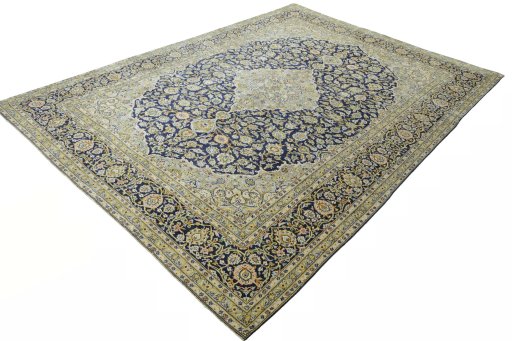 Corner detail of 2000s Kashan rug showing border pattern and Wool pile