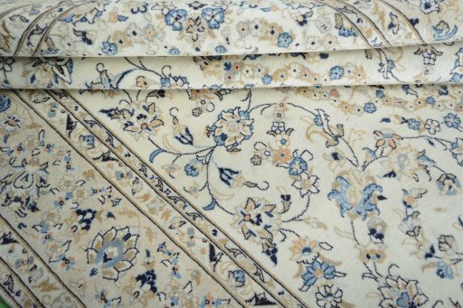 Close-up detail of 2000s Kashan rug from Iran / Persia showing Wool weave