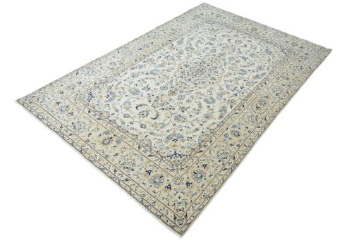 Corner detail of 2000s Kashan rug showing border pattern and Wool pile