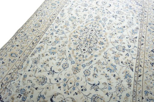 Backside of handmade 2000s Kashan rug showing knot structure and weave density