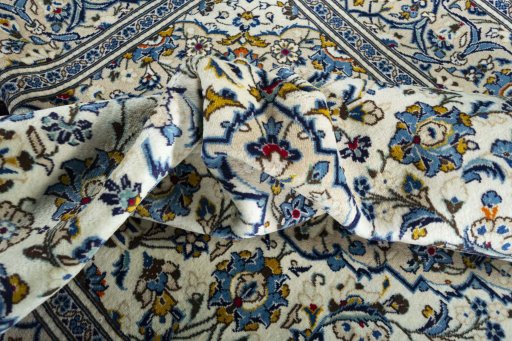 Central medallion detail of 2000s Kashan rug from Iran / Persia