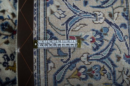 Close-up detail of 2000s Kashan rug from Iran / Persia showing Wool weave