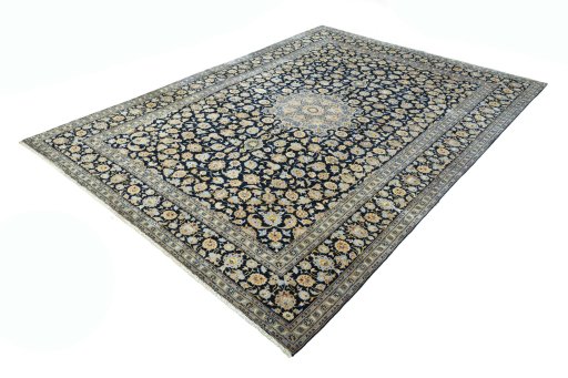 Corner detail of 2000s Kashan rug showing border pattern and Wool pile