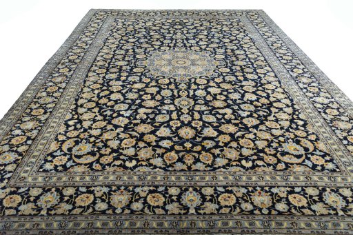 Surface texture of 2000s Kashan rug with natural Wool and intricate pattern