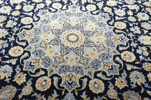 Central medallion detail of 2000s Kashan rug from Iran / Persia