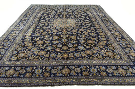 Surface texture of 2000s Kashan rug with natural Wool and intricate pattern