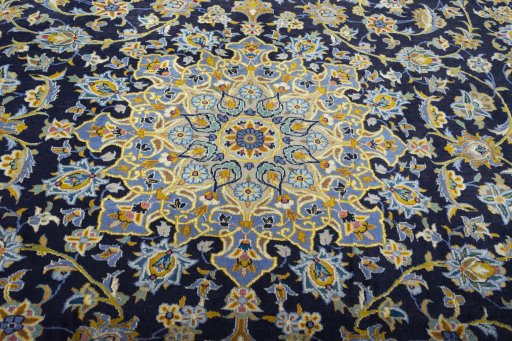 Central medallion detail of 2000s Kashan rug from Iran / Persia