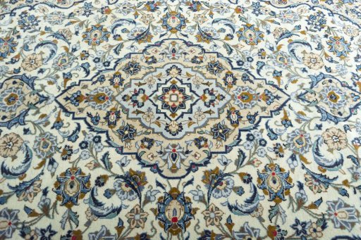 Central medallion detail of 2000s Kashan rug from Iran / Persia