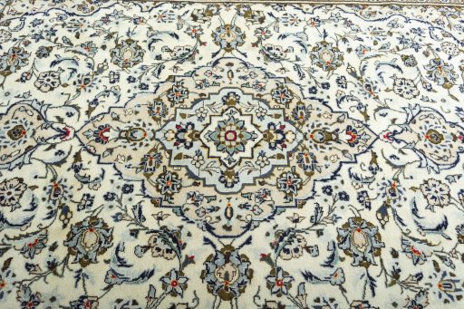 Central medallion detail of 2000s Kashan rug from Iran / Persia