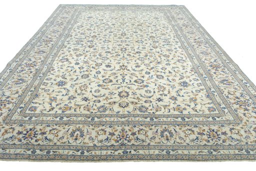 Surface texture of 2000s Kashan rug with natural Wool and intricate pattern
