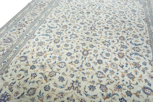 Backside of handmade 2000s Kashan rug showing knot structure and weave density