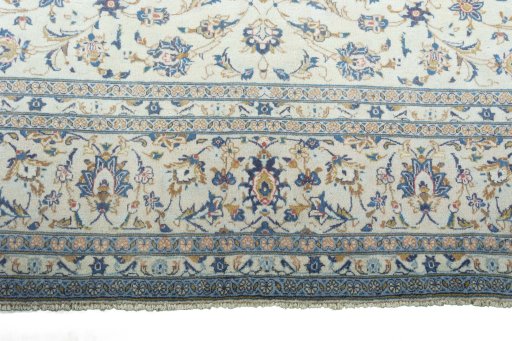 Close-up detail of 2000s Kashan rug from Iran / Persia showing Wool weave