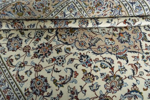 Close-up detail of 2000s Kashan rug from Iran / Persia showing Wool weave