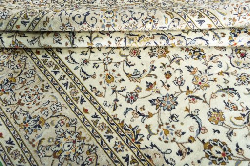 Close-up detail of 2000s Kashan rug from Iran / Persia showing Wool weave