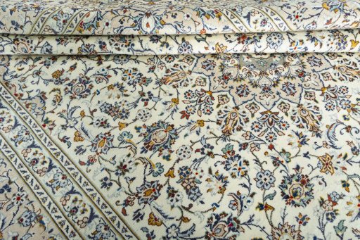 Close-up detail of 2000s Kashan rug from Iran / Persia showing Wool weave
