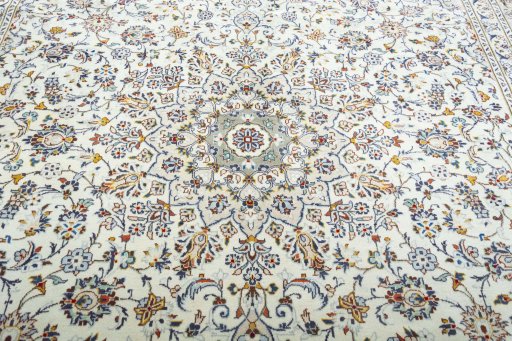 Central medallion detail of 2000s Kashan rug from Iran / Persia
