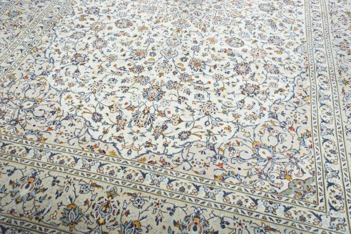 Close-up detail of 2000s Kashan rug from Iran / Persia showing Wool weave