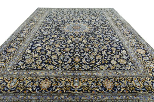 Surface texture of 2000s Kashan rug with natural Wool and intricate pattern