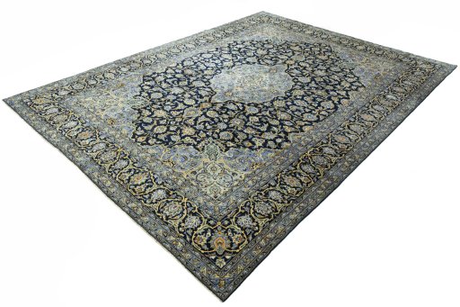 Corner detail of 2000s Kashan rug showing border pattern and Wool pile