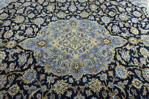 Central medallion detail of 2000s Kashan rug from Iran / Persia