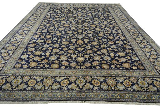 Surface texture of 2000s Kashan rug with natural Wool and intricate pattern