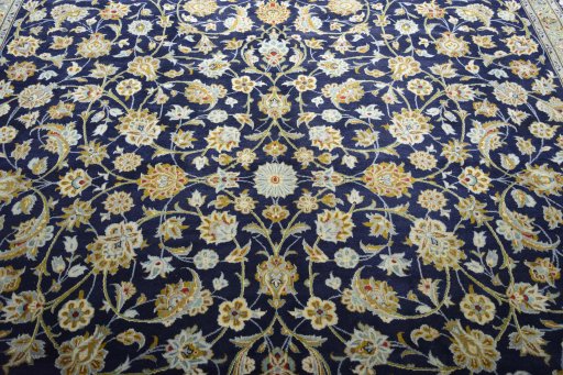 Central medallion detail of 2000s Kashan rug from Iran / Persia